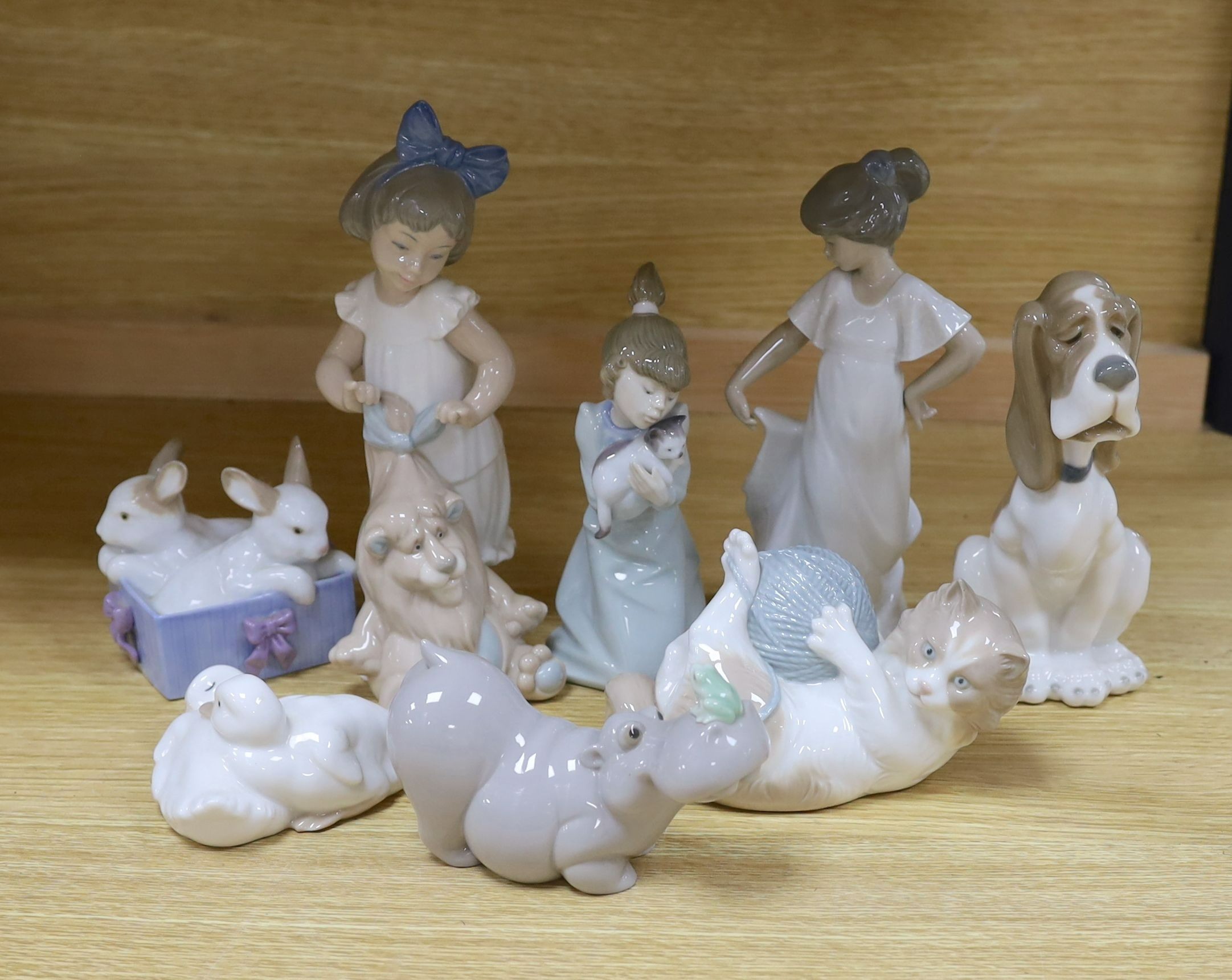 A selection of Lladro and Nao figures